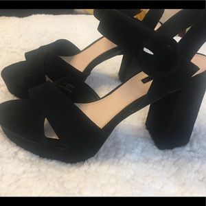 Open toe high heeled shoes